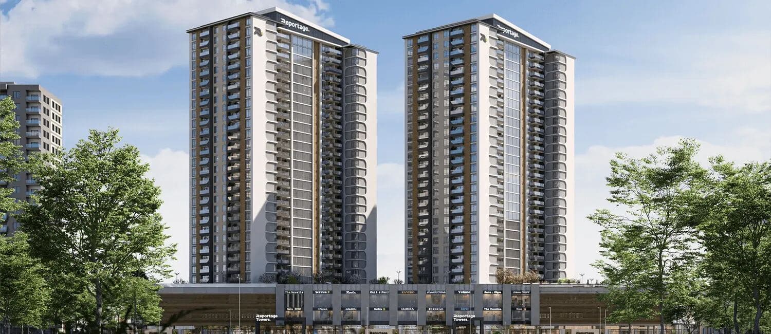 Modern twin high-rise towers above a retail podium at Reportage Towers