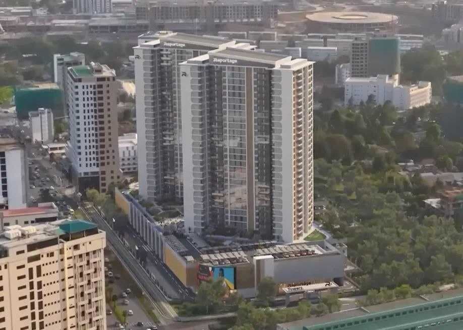 Aerial day view of Reportage Towers twin high-rises